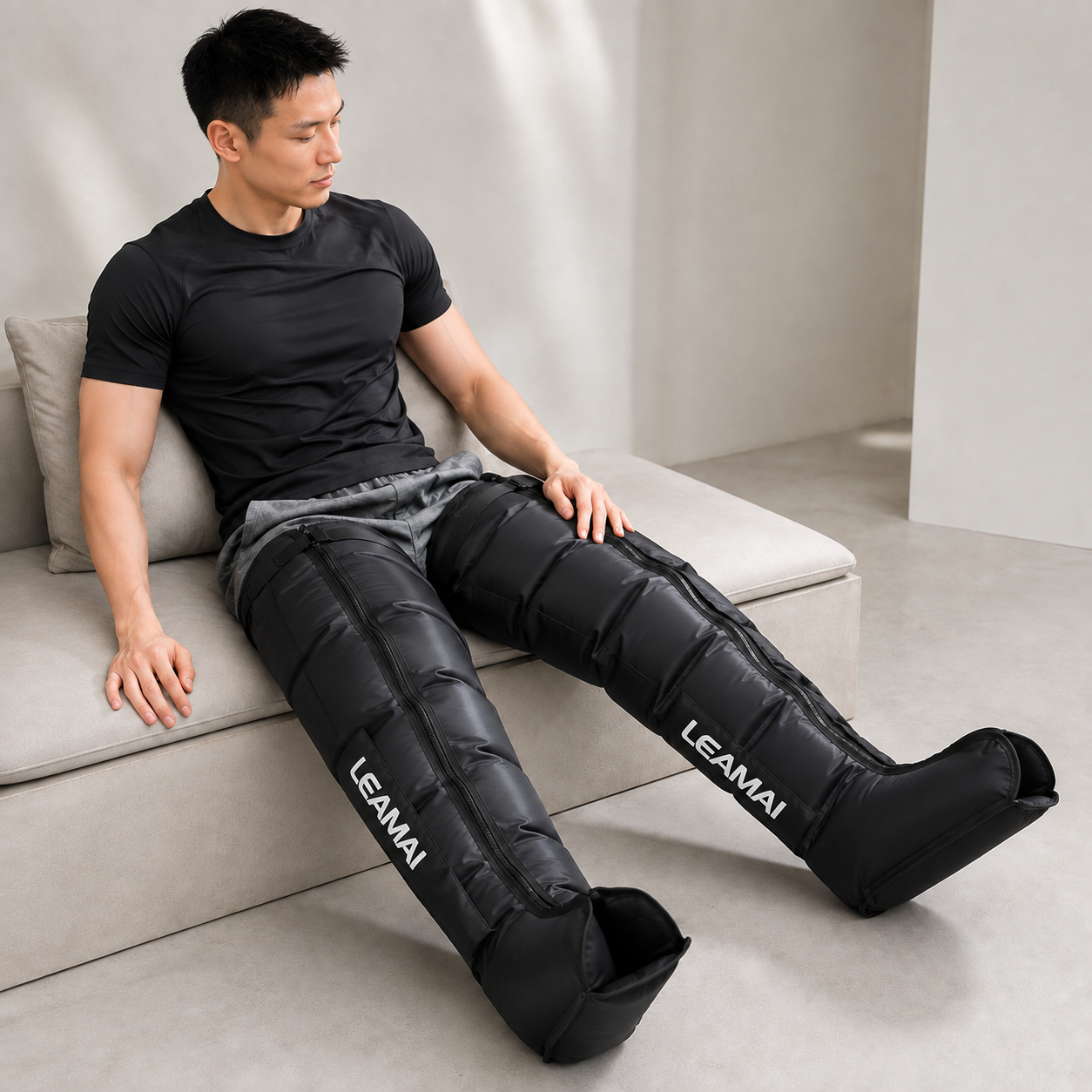 Onda Core 6 recovery boots worn seated during a recovery session